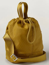 Excursion Crossbody Bucket Bag